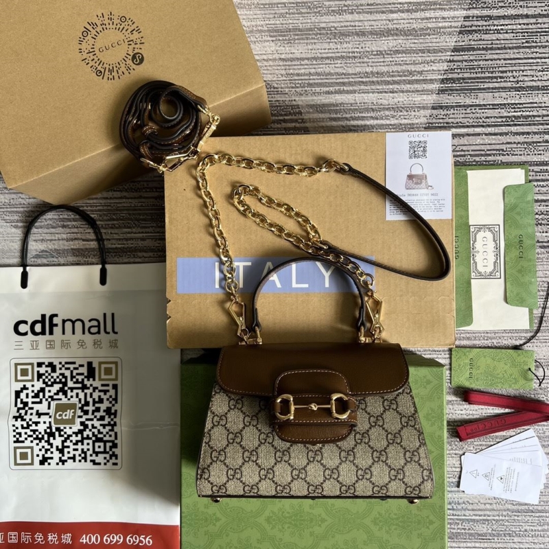 G*u*i top handle bags